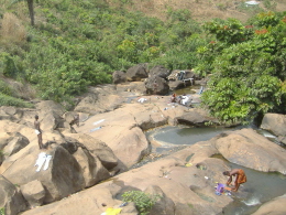 Washing and bathing is done in the river.