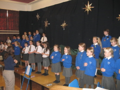 Miss Crawford leads the Year 3 choir.