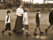 Children and teacher in Victorian costume